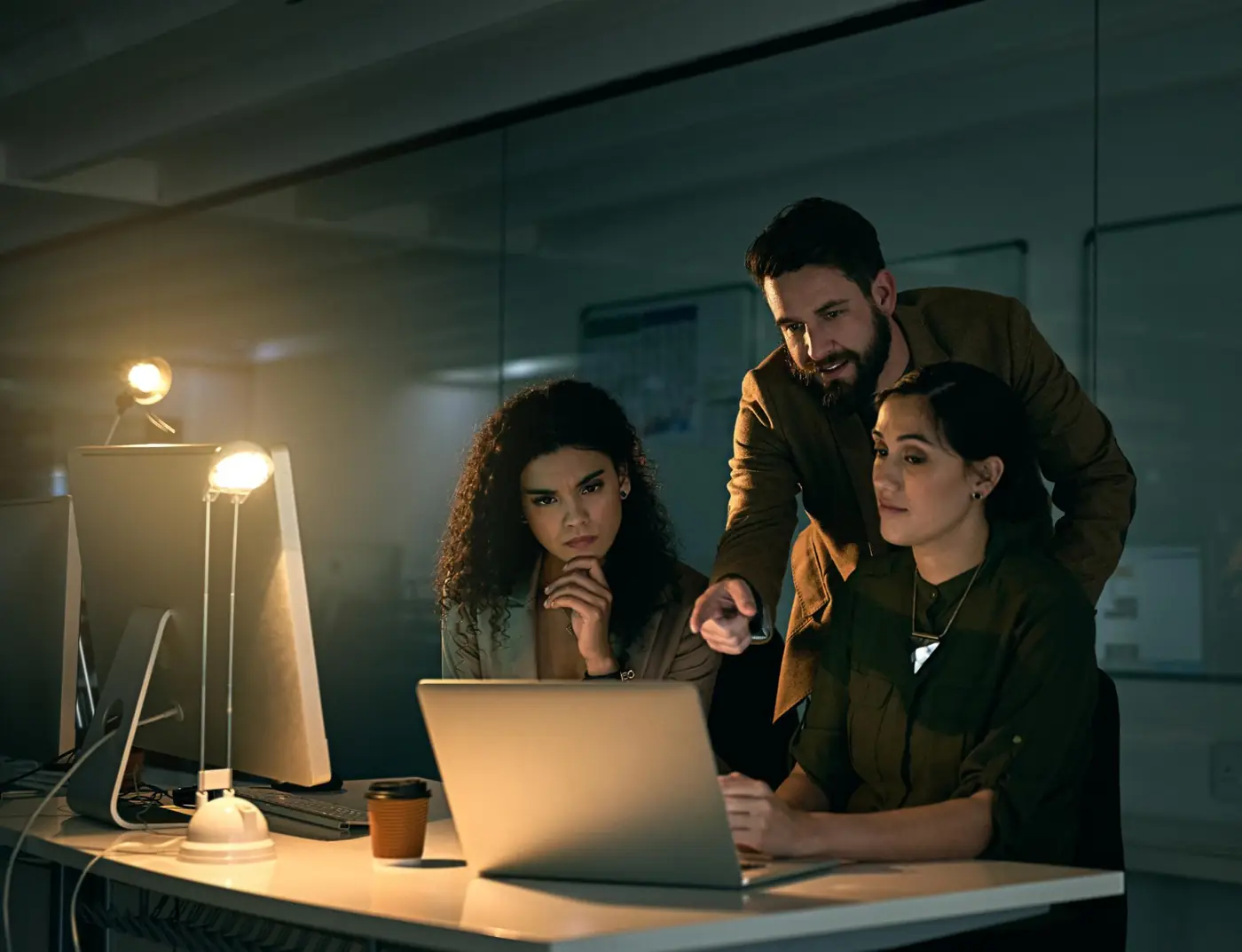 A team reviewing a security alert together